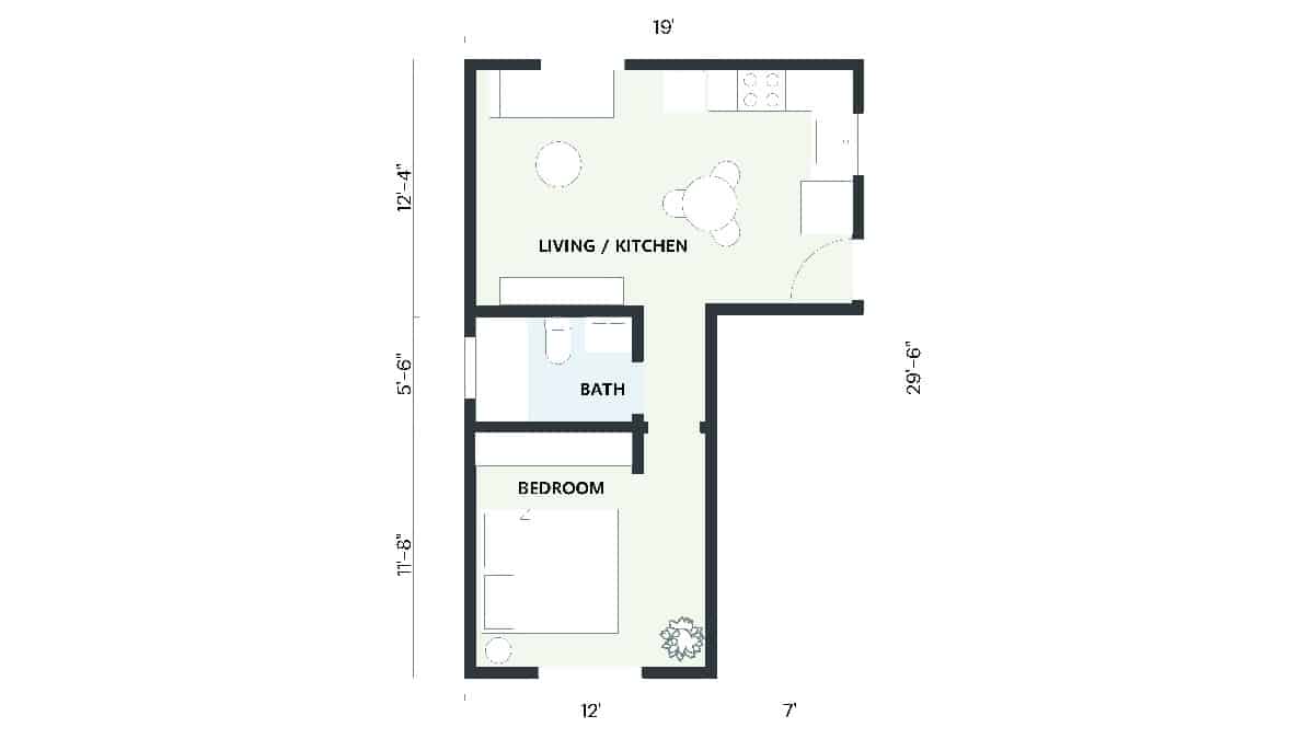2D floor plan of a 440 sq ft small ADU featuring 1 bedroom and 1 bath with an L-shaped kitchen and living area.