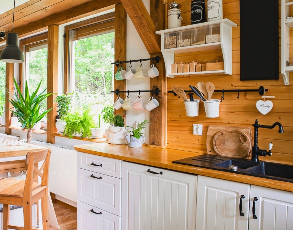Charming rustic ADU design featuring natural wood elements and cozy kitchen space.